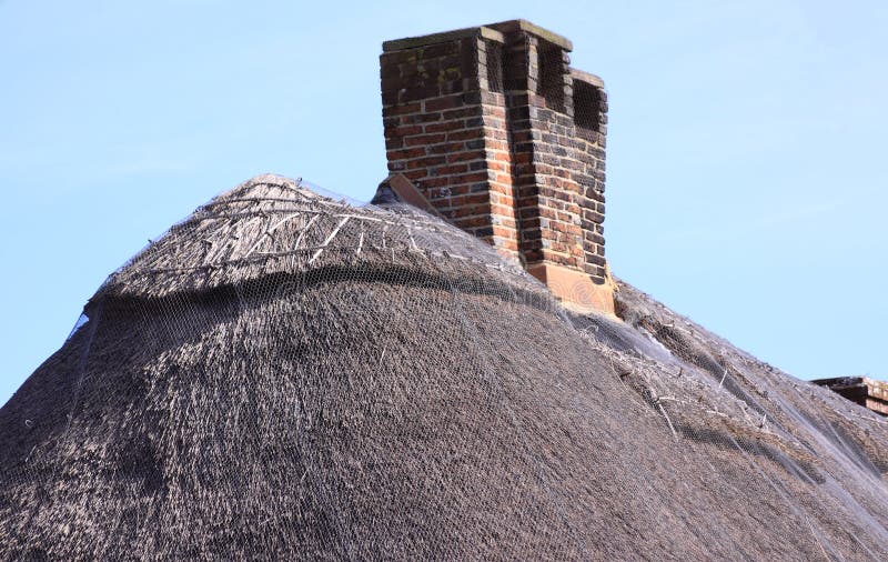 Chimney stack on thatch roof