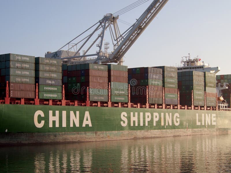 China Shipping Line Shipping boat is unloaded by cranes in Oakland Harbor