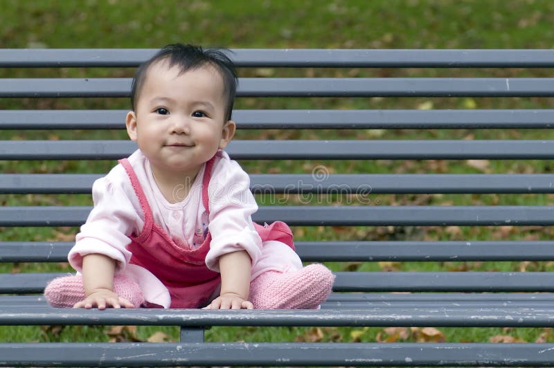 Chinese baby on the bench