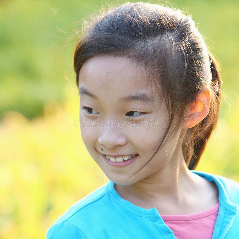 Chinese child smiling face stock photo. Image of teens - 14890466