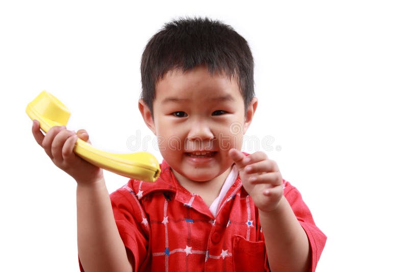 Girl playing phone with white background,a happy lovely baby. Girl playing phone with white background,a happy lovely baby