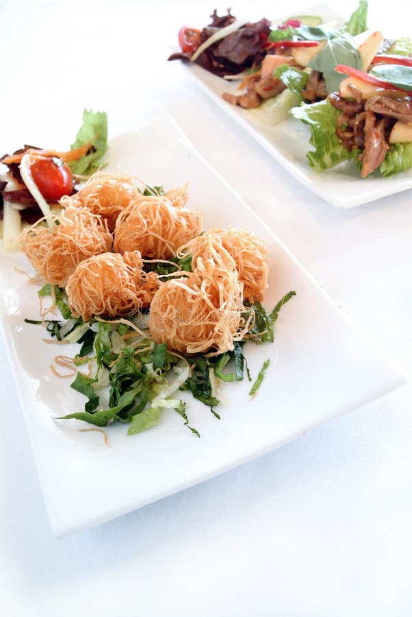 Chinese Crispy Pork Balls and Asian Duck Salad Stock Image - Image of ...