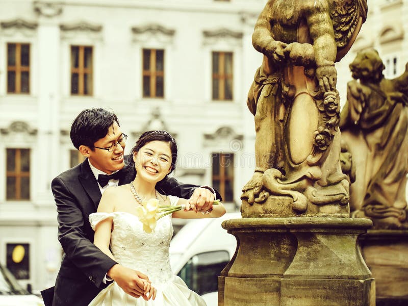 https://thumbs.dreamstime.com/b/chinese-cute-young-newlyweds-chinese-cute-happy-smiling-bride-groom-young-newlyweds-just-married-couple-streets-old-city-135131197.jpg