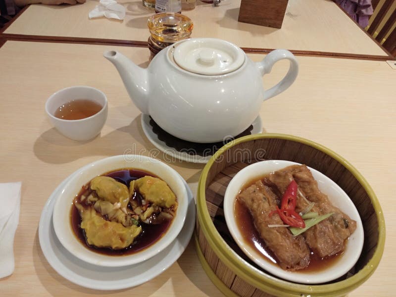 Chinese Dim Sum and Tea Set on Restaurant Table. Dimsum restaurant stock images, royalty-free photos and pictures