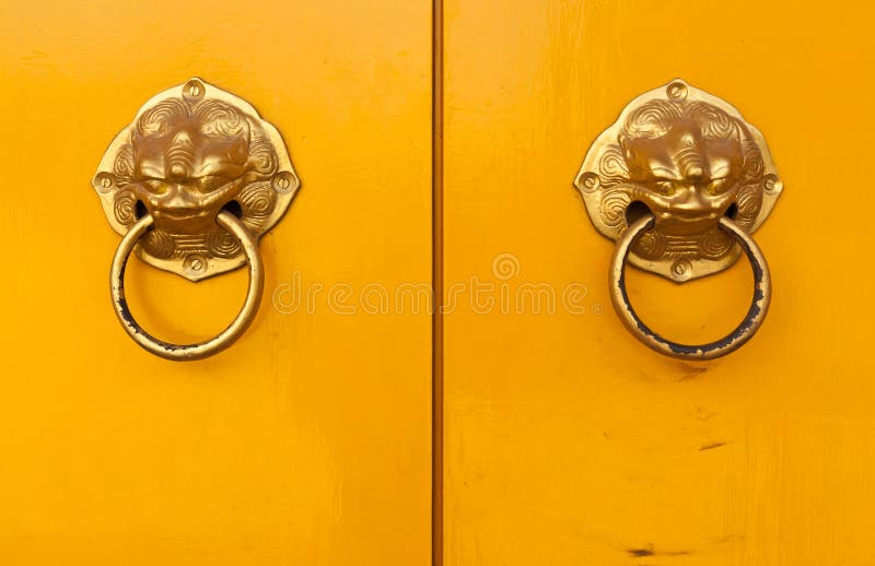 Chinese door handles on yellow doors