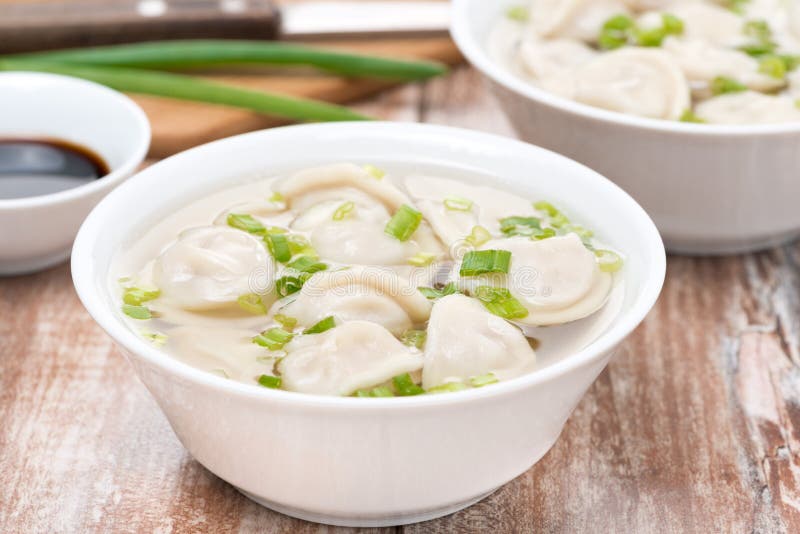 Chicken Broth with Chinese Dumplings on White Table Stock Image Image