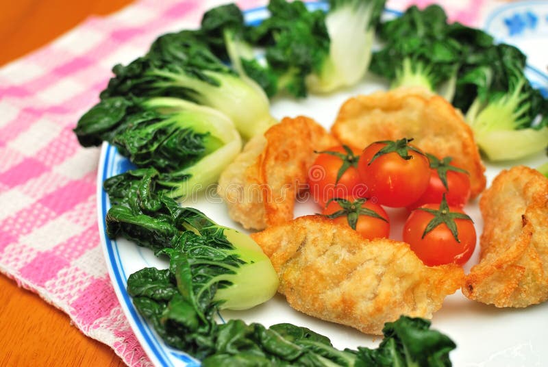 Chinese dumplings and vegetables