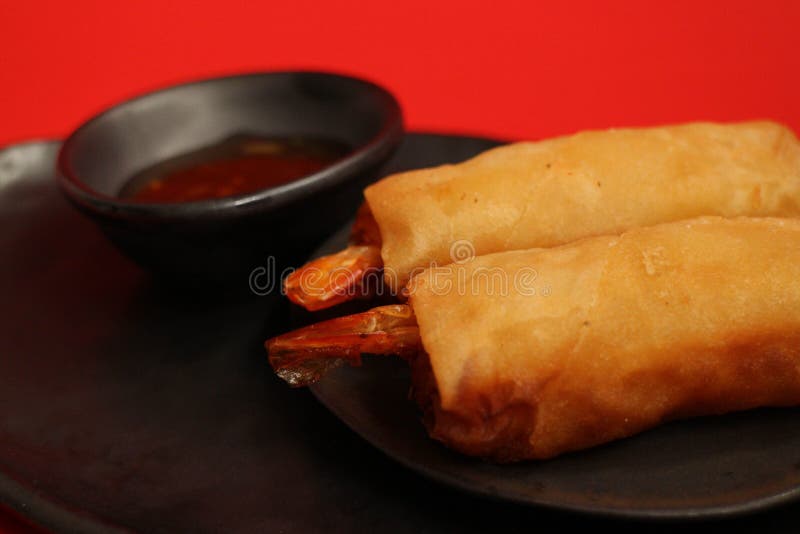 Chinese Food, Fried Shrimp Spring Roll on Copper Background Stock Photo