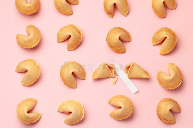 Chinese fortune cookies. Cookies texture pattern with empty blank inside for word prediction. Pink background