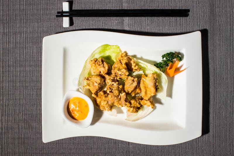 Chinese fried chicken with spicy mayonnaise sauce and salad royalty free stock image Chinese fried chicken with spicy mayonnaise sauce and salad royalty free stock image