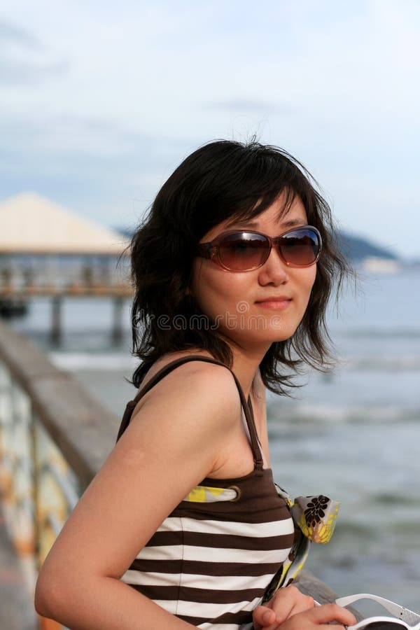 Chinese girl at beach stock image. Image of chinese, happy - 11930067