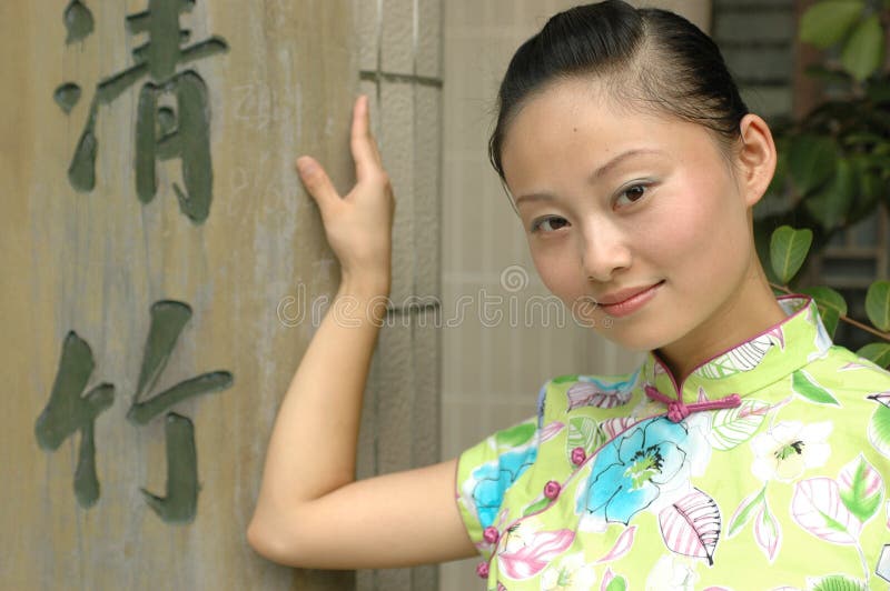 Chinese girl with Chinese signs