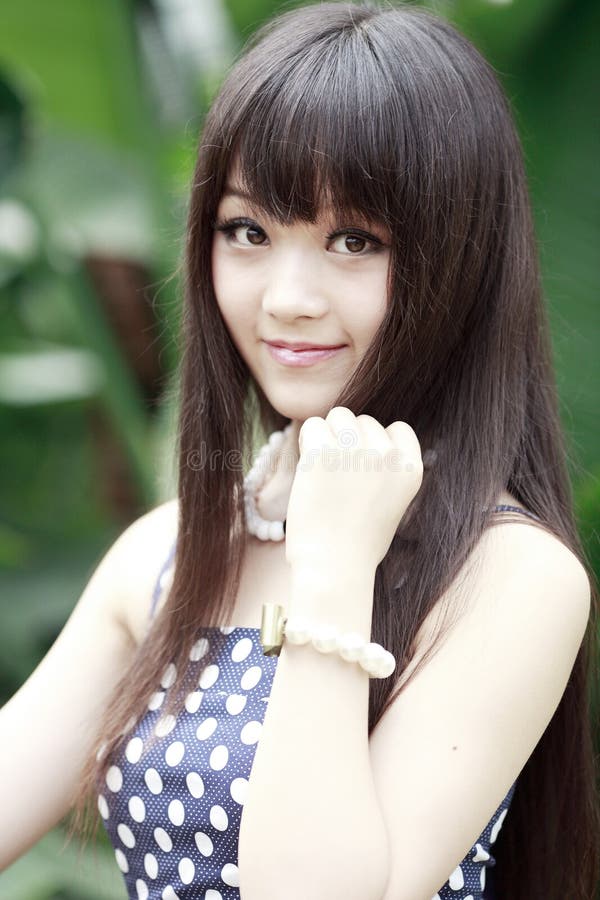 Beautiful Chinese girl, look, blurry background 1125x2436 iPhone 11  Pro/XS/X wallpaper, background, picture, image
