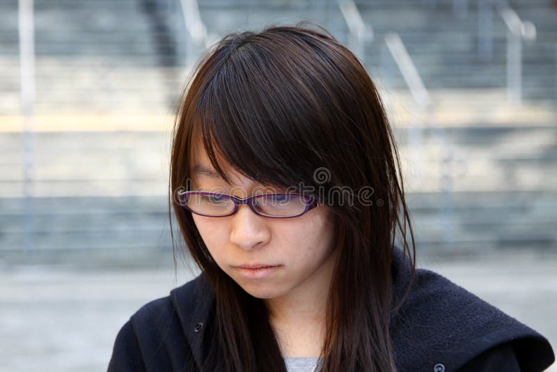 Chinese girl with sad face