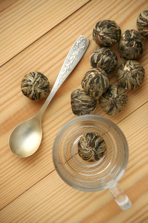 Chinese Green Tea Balls with Jasmine Flowers, Tea Cup Stock Image