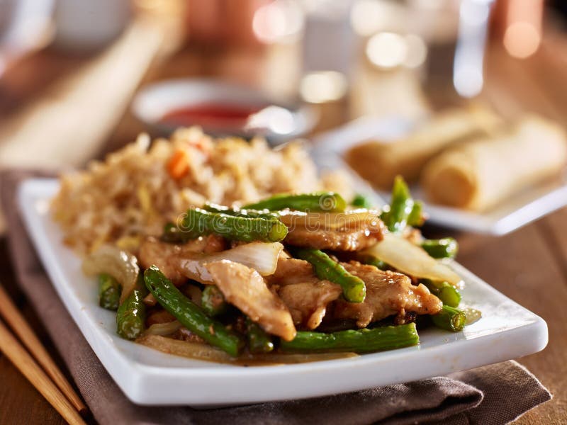 Chinese greenbean and chicken stir fry with fried rice stock photography Chinese greenbean and chicken stir fry with fried rice stock photography