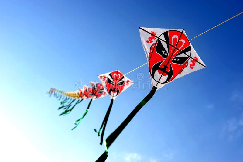 Chinese kite stock image. Image of multi, flies, human 12858693