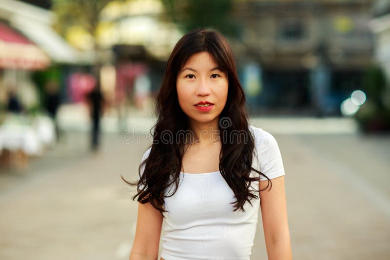 Chinese lady in the street stock image. Image of relaxing - 180915927