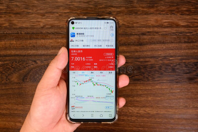 Chinese Man Checking The USD To RMB Rate On Mobile Editorial Image chinese-man-checking-the-usd-to-rmb-rate-on-mobile-editorial-image