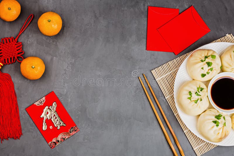 Chinese New Year Decoration With Dumplings Tangerines Soy Sauce