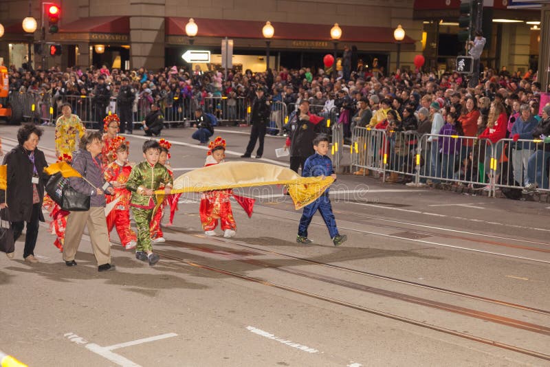 Chinese New Year Parade in Chinatown. SAN FRANCISCO - FEBRUARY 23: Chinese New Year Parade in Chinatown on February 23, 2013 in San Francisco, California. Over stock image Chinese New Year Parade in Chinatown. SAN FRANCISCO - FEBRUARY 23: Chinese New Year Parade in Chinatown on February 23, 2013 in San Francisco, California. Over stock image