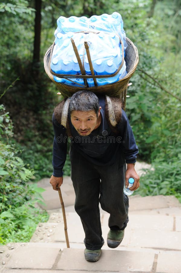 Chinese old man carry bottled water