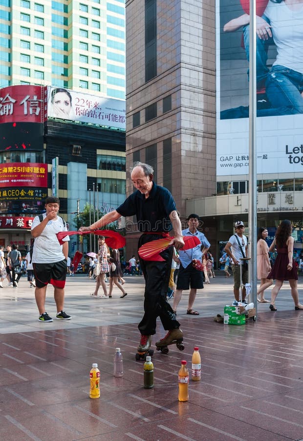 Chinese Old Man on Roller Skates Editorial Stock Image Image of