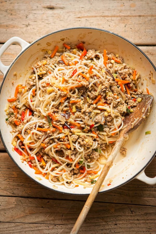 Chinese Pork Noodle Stir Fry with Egg Noodles and Vegetables Stock
