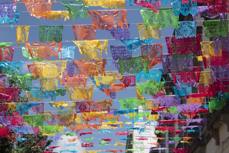 Chinese shredded paper is used to decorate the day of the dead festivities throughout Mexico. Chinese shredded paper is used to decorate the day of the dead festivities throughout Mexico