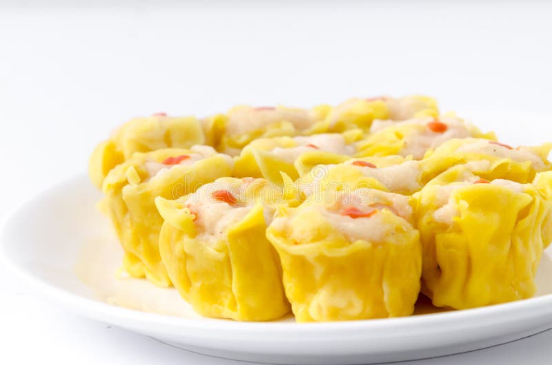 Chinese steamed shrimp dumplings on white dish. stock image Chinese steamed shrimp dumplings on white dish. stock image
