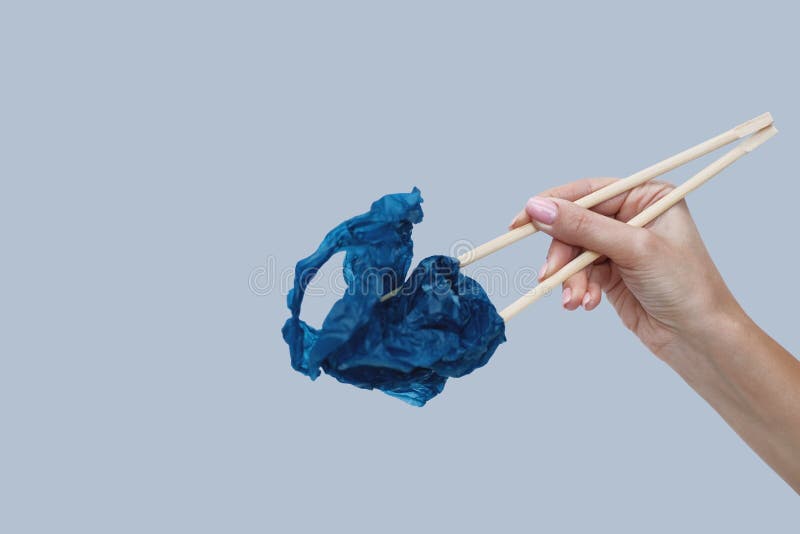Chinese Sticks Hold a Plastic Bag Stock Photo Image of environment, single 165321250