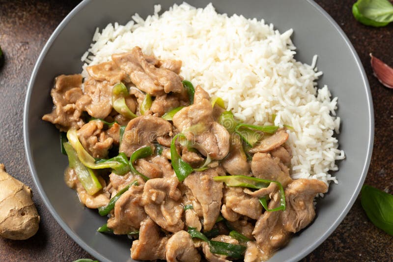 Chinese Stir Fry Pork with Ginger Sauce, Garlic and Spring Onion. Asian