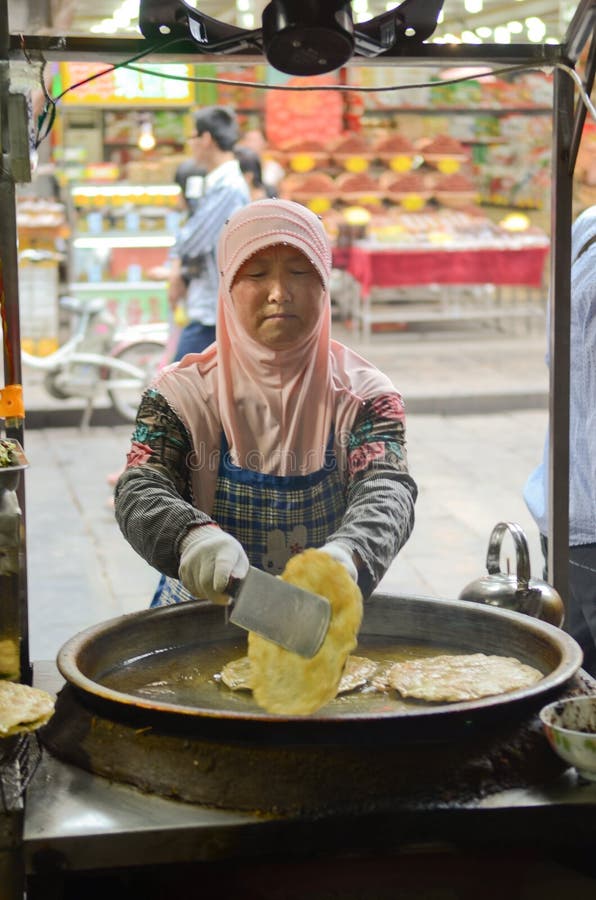Chinese street cooking editorial stock photo. Image of asian - 34946083