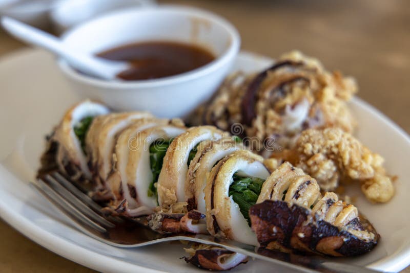 Squid. Chinese Stirfried Squid With Black Pepper , Garlic And S Stock