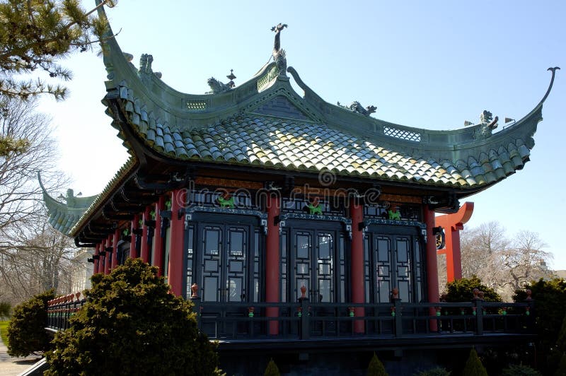 A chinese tea house, with a green roof