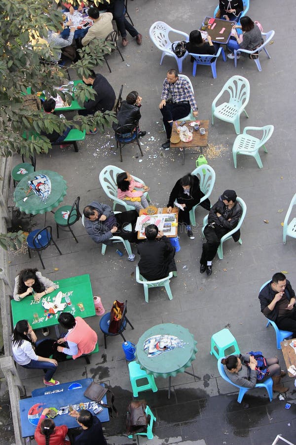 Overlooking the outdoor tea house, people playing poker. Photo taken on March 16, 2014 in Chongqing, China. Overlooking the outdoor tea house, people playing poker. Photo taken on March 16, 2014 in Chongqing, China.