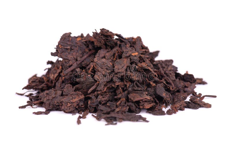 Chinese tea Shou Puer. Pressed fermented Pu-erh tea. Macro close up. Aromatic black puer tea. Healthy drink. royalty free stock images Chinese tea Shou Puer. Pressed fermented Pu-erh tea. Macro close up. Aromatic black puer tea. Healthy drink. royalty free stock images