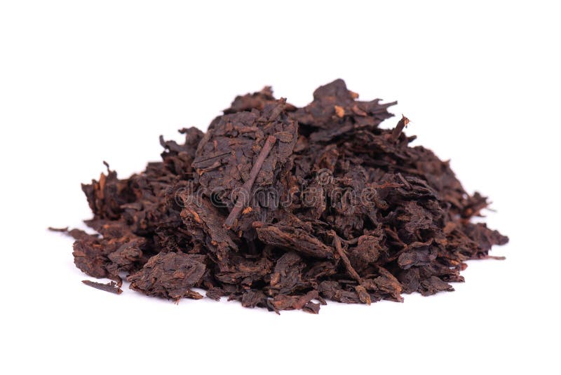 Chinese tea Shou Puer. Pressed fermented Pu-erh tea. Macro close up. Aromatic black puer tea. Healthy drink. royalty free stock photo Chinese tea Shou Puer. Pressed fermented Pu-erh tea. Macro close up. Aromatic black puer tea. Healthy drink. royalty free stock photo