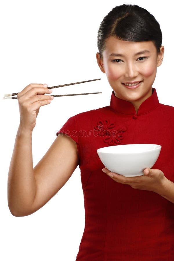 Chinese woman showing asian food using chopstick on white. Chinese woman showing asian food using chopstick on white