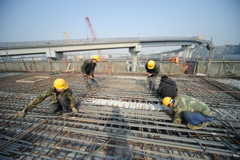 Chinese workers construct viaduct