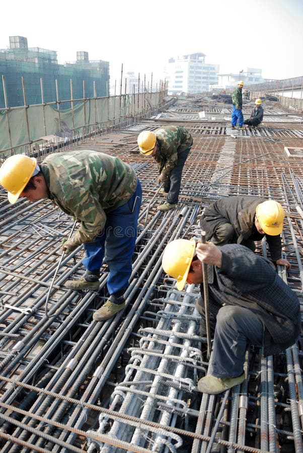 Chinese workers construct viaduct