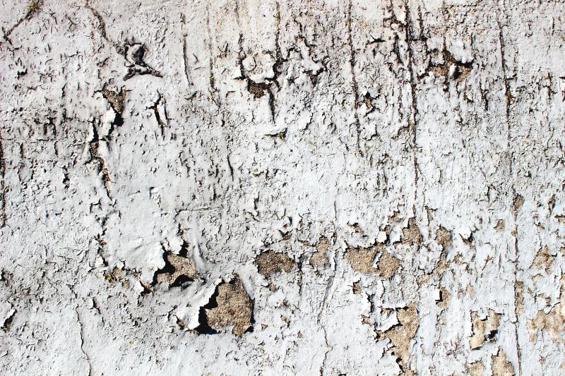 A Chipped Grey Pastel Paint on the Wall As a Texture Stock Photo