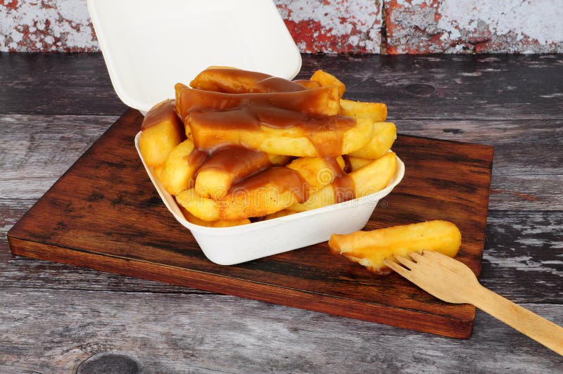 Chips and Gravy Isolated stock image. Image of fries 221861729