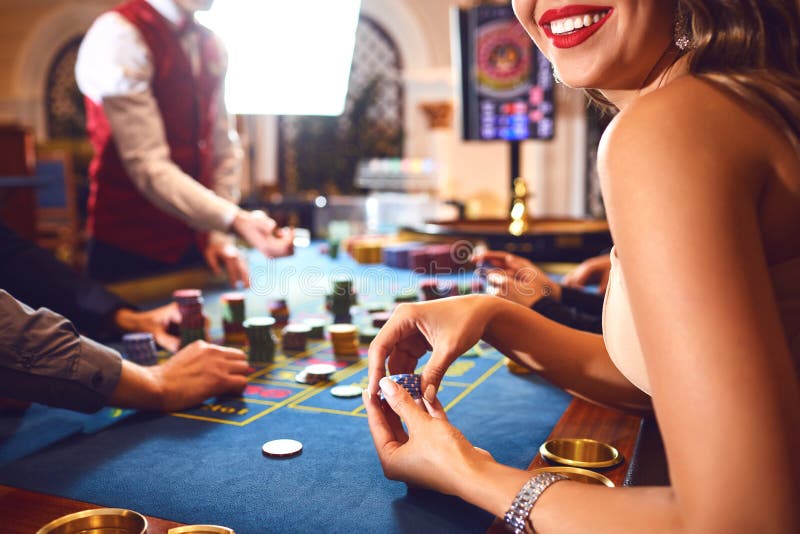 Chips in the Hands of a Male Roulette Player in Casino Background ...