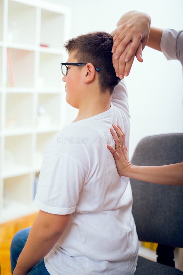 Chiropractor Doing Adjustment on Patient Stock Image Image of