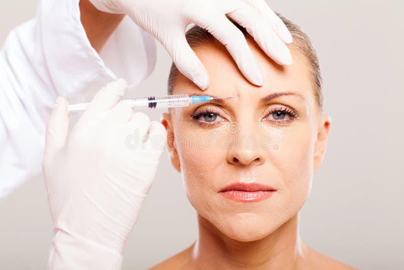 Levage de visage cosmétique photos libres de droits Levage de visage cosmétique photos libres de droits