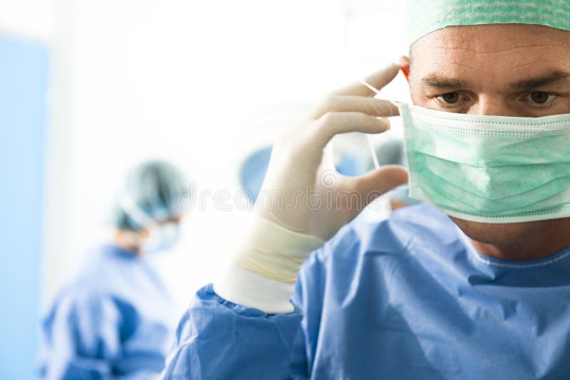 Surgeon Wearing Protective Mask, ready for oepration. Surgeon Wearing Protective Mask, ready for oepration