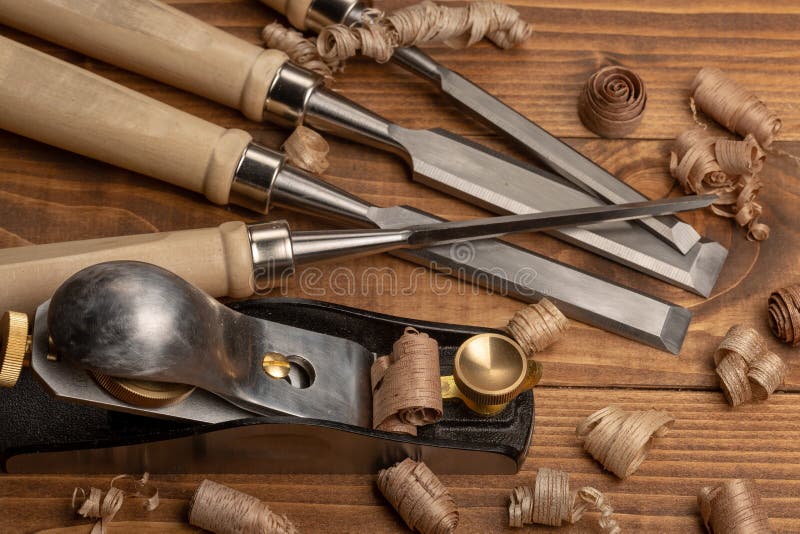 Chisel And Small Block Plane With Wood Shavings Stock Photo