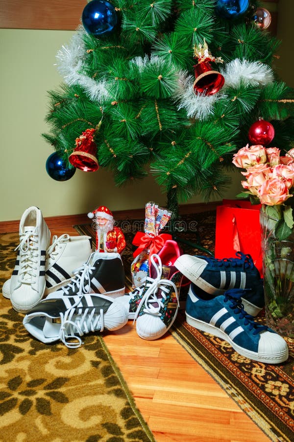 Chisinau, Republic of Moldova - January 04, 2016: Sneakers Superstar  Company Adidas on Background of the Christmas Tree. Editorial Stock Photo -  Image of fashion, editorial: 104833128