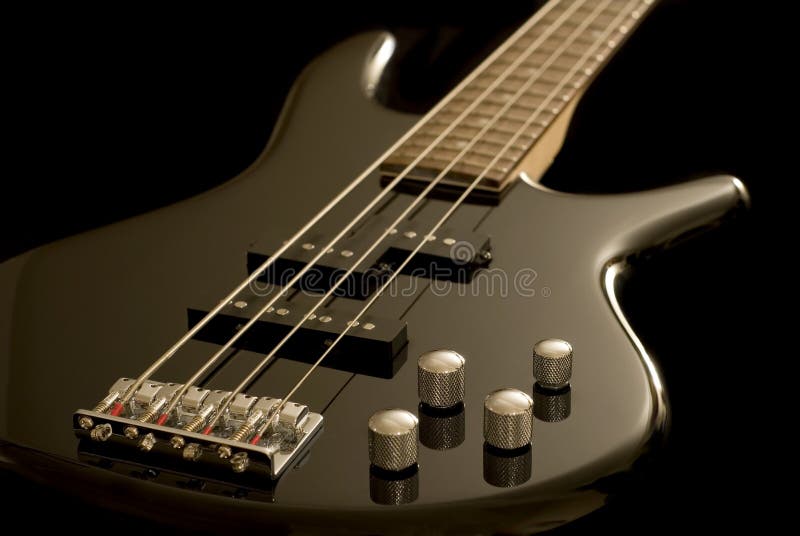 Chitarra bassa elettrica fotografia stock Chitarra bassa elettrica fotografia stock